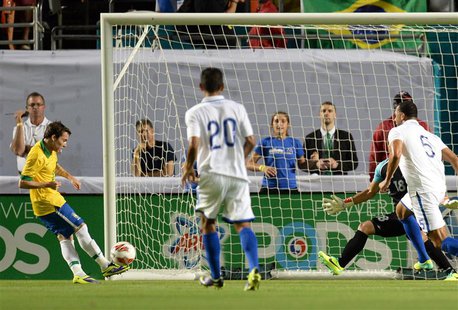 Nov 16, 2013; Miami Gardens, FL, USA; Brazil forward Bernard (20) scores a goal against Honduras during the first half at Sun Life Stadium. Nov 16, 2013; Miami Gardens, FL, USA; Brazil forward Bernard (20) scores a goal against Honduras during the first half at Sun Life Stadium.