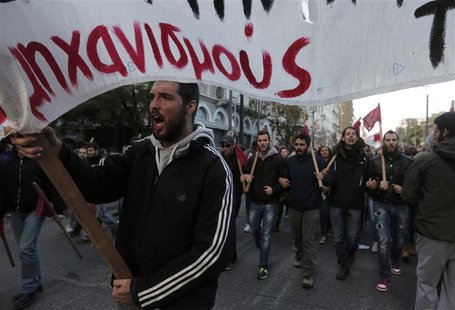 Protesters take part in a rally marking the anniversary of the 1973 student uprising against Greece's former military dictatorship, in Athen Protesters take part in a rally marking the anniversary of the 1973 student uprising against Greece's former military dictatorship, in Athen