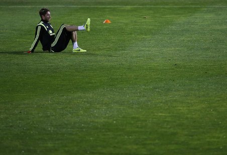 Spain national player Sergio Ramos takes part in a soccer training session at Soccer City in Las Rozas, near Madrid, November 13, 2013. REUT Spain national player Sergio Ramos takes part in a soccer training session at Soccer City in Las Rozas, near Madrid, November 13, 2013. REUT
