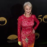 British actress Helen Mirren poses on the red carpet as she arrives at an event celebrating the 50th anniversary of the Mandarin Oriental ho British actress Helen Mirren poses on the red carpet as she arrives at an event celebrating the 50th anniversary of the Mandarin Oriental ho