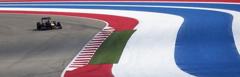 Red Bull Formula One driver Sebastian Vettel of Germany takes a turn while competing in the Austin F1 Grand Prix at the Circuit of the Ameri Red Bull Formula One driver Sebastian Vettel of Germany takes a turn while competing in the Austin F1 Grand Prix at the Circuit of the Ameri