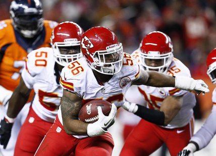 Nov 17, 2013; Denver, CO, USA; Kansas City Chiefs inside linebacker Derrick Johnson (56) returns a fumble in the first quarter against the D Nov 17, 2013; Denver, CO, USA; Kansas City Chiefs inside linebacker Derrick Johnson (56) returns a fumble in the first quarter against the D