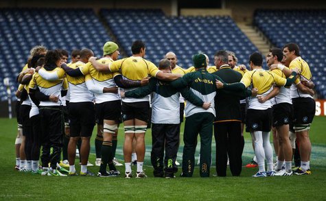 South Africa head coach Heyneke Meyer (4th R) speaks to his players in a huddle during their 'Captain's Run' training session, ahead of thei South Africa head coach Heyneke Meyer (4th R) speaks to his players in a huddle during their 'Captain's Run' training session, ahead of thei