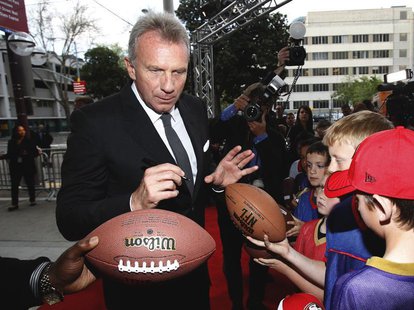 Inductee and former San Francisco 49'ers quarterback Joe Montana signs autographs as he arrives at the 7th Annual California Hall of Fame in Inductee and former San Francisco 49'ers quarterback Joe Montana signs autographs as he arrives at the 7th Annual California Hall of Fame in
