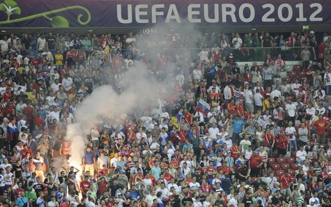 Russia's soccer fans react after defeat at the Group A Euro 2012 soccer match against Greece at National stadium in Warsaw, June 16, 2012. R Russia's soccer fans react after defeat at the Group A Euro 2012 soccer match against Greece at National stadium in Warsaw, June 16, 2012. R
