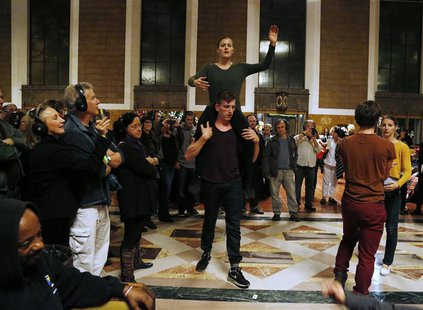 Members of the L.A. Dance Project perform the opera "Invisible Cities" at the Amtrak's Union Station in Los Angeles November 15, 2013. REUTE Members of the L.A. Dance Project perform the opera "Invisible Cities" at the Amtrak's Union Station in Los Angeles November 15, 2013. REUTE