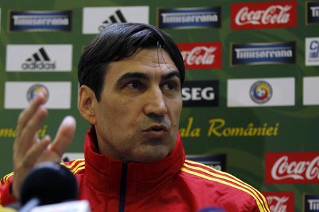 Romania's national soccer team coach Victor Piturca attends a news conference in Mogosoaia, near Bucharest, November 18, 2013. REUTERS/Bogda Romania's national soccer team coach Victor Piturca attends a news conference in Mogosoaia, near Bucharest, November 18, 2013. REUTERS/Bogda