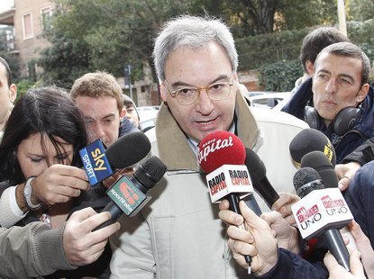 Italian Serie A president Maurizio Beretta (C) talks to reporters as he arrives to attend a meeting in Rome December 7, 2010. REUTERS/Tony G Italian Serie A president Maurizio Beretta (C) talks to reporters as he arrives to attend a meeting in Rome December 7, 2010. REUTERS/Tony G