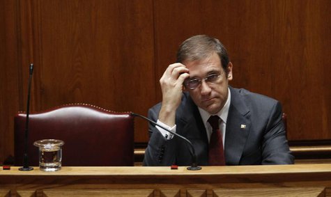 Portugal's Prime Minister Pedro Passos Coelho reacts during the presentation of the 2014 state budget at parliament in Lisbon November 1, 20 Portugal's Prime Minister Pedro Passos Coelho reacts during the presentation of the 2014 state budget at parliament in Lisbon November 1, 20