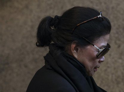 Vilma Bautista, the ex-secretary of former Philippine first lady Imelda Marcos, leaves Manhattan Criminal Court in New York October 21, 2013 Vilma Bautista, the ex-secretary of former Philippine first lady Imelda Marcos, leaves Manhattan Criminal Court in New York October 21, 2013
