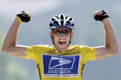 U.S. Postal Service Team rider Lance Armstrong of the United States raises his arms as he crosses the finish line to win the 204.5 km long 1 U.S. Postal Service Team rider Lance Armstrong of the United States raises his arms as he crosses the finish line to win the 204.5 km long 1