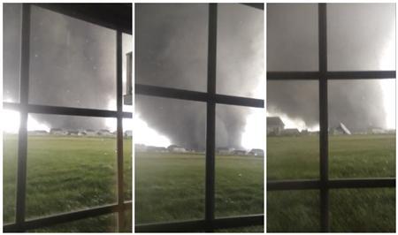 An active tornado is seen through a window as it touches down in Washington, Illinois on November 17, 2013, in this combination of three still images captured from a video courtesy of Anthony Khoury. An active tornado is seen through a window as it touches down in Washington, Illinois on November 17, 2013, in this combination of three still images captured from a video courtesy of Anthony Khoury.