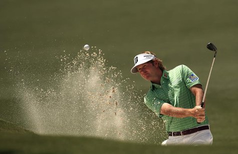 Brandt Snedeker of the U.S. hits from a sand trap on the second hole during third round play in the 2013 Masters golf tournament at the Augu Brandt Snedeker of the U.S. hits from a sand trap on the second hole during third round play in the 2013 Masters golf tournament at the Augu