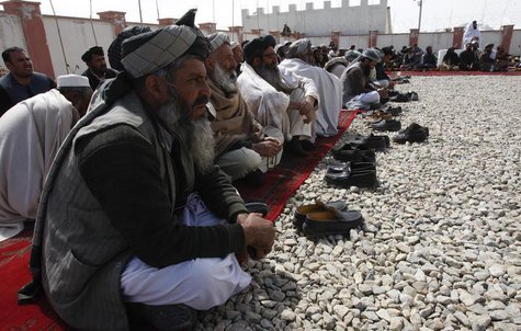 Afghan elders gather during a meeting in Maidan, Wardak province, March 11, 2013. REUTERS/ Mohammad Ishaq Afghan elders gather during a meeting in Maidan, Wardak province, March 11, 2013. REUTERS/ Mohammad Ishaq