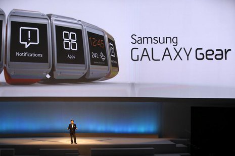 Shin Jong-kyun, President and CEO, head of IT and Mobile Communication division of Samsung presents the Samsung Galaxy Gear smartwatch durin Shin Jong-kyun, President and CEO, head of IT and Mobile Communication division of Samsung presents the Samsung Galaxy Gear smartwatch durin