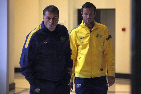 Captain of the Australian soccer team Lucas Neill (R) walks with new team coach Ange Postecoglou to a media conference in Sydney November 18 Captain of the Australian soccer team Lucas Neill (R) walks with new team coach Ange Postecoglou to a media conference in Sydney November 18