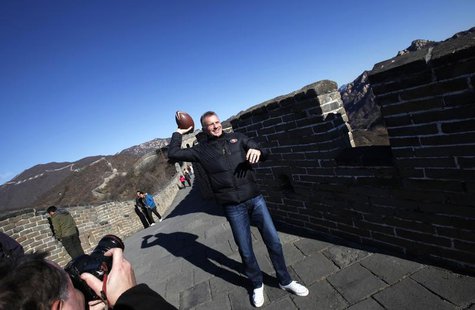 National Football League (NFL) Hall of Famer and former quarterback Joe Montana throws a football on the Mutianyu section of the Great Wall National Football League (NFL) Hall of Famer and former quarterback Joe Montana throws a football on the Mutianyu section of the Great Wall