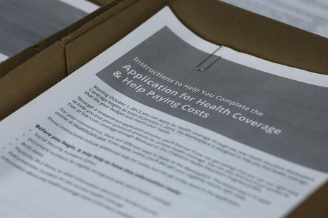 Paper applications are available in lieu of using the HealthCare.gov website at a health care enrolment fair co-sponsored by Planned Parenth Paper applications are available in lieu of using the HealthCare.gov website at a health care enrolment fair co-sponsored by Planned Parenth