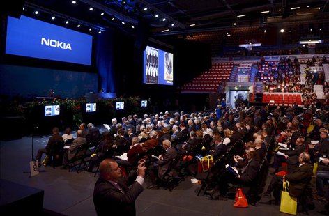 Shareholders attend Nokia's extraordinary general meeting (EGM) in Helsinki November 19, 2013. REUTERS/Antti Aimo-Koivisto/Lehtikuva Shareholders attend Nokia's extraordinary general meeting (EGM) in Helsinki November 19, 2013. REUTERS/Antti Aimo-Koivisto/Lehtikuva