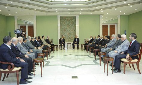 Syria's President Bashar al-Assad (center L) meets members of the General Secretariat of the Arab Parties' General Conference in Damascus No Syria's President Bashar al-Assad (center L) meets members of the General Secretariat of the Arab Parties' General Conference in Damascus No