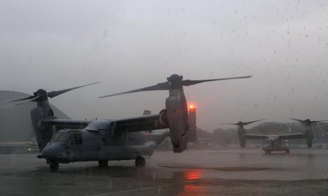 Two U.S. Marines V-22 Ospreys, ferrying personnel to help in the relief efforts in Tacloban City, are seen on the tarmac at Villamor Air Bas Two U.S. Marines V-22 Ospreys, ferrying personnel to help in the relief efforts in Tacloban City, are seen on the tarmac at Villamor Air Bas