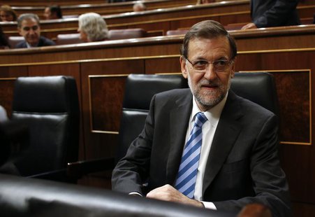 Spain's Prime Minister Mariano Rajoy attends a weekly cabinet control session at Parliament in Madrid October 30, 2013. REUTERS/Juan Medina Spain's Prime Minister Mariano Rajoy attends a weekly cabinet control session at Parliament in Madrid October 30, 2013. REUTERS/Juan Medina