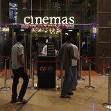 Cinema-goers queue for a security check at a PVR Multiplex in Mumbai November 10, 2013. REUTERS/Danish Siddiqui Cinema-goers queue for a security check at a PVR Multiplex in Mumbai November 10, 2013. REUTERS/Danish Siddiqui