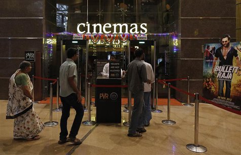 Cinema-goers queue for a security check at a PVR Multiplex in Mumbai November 10, 2013. REUTERS/Danish Siddiqui Cinema-goers queue for a security check at a PVR Multiplex in Mumbai November 10, 2013. REUTERS/Danish Siddiqui