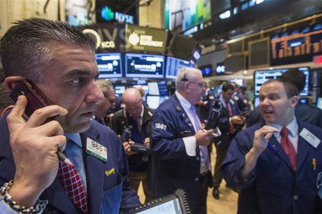 Traders work on the floor of the New York Stock Exchange, November 19, 2013. REUTERS/Brendan McDermid Traders work on the floor of the New York Stock Exchange, November 19, 2013. REUTERS/Brendan McDermid