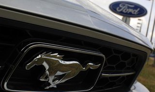 A Ford Mustang is seen at Jerry's Ford car dealership in Alexandria, Virginia, July 23, 2009. REUTERS/Jim Young A Ford Mustang is seen at Jerry's Ford car dealership in Alexandria, Virginia, July 23, 2009. REUTERS/Jim Young