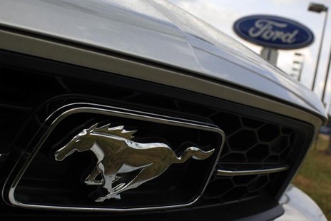 A Ford Mustang is seen at Jerry's Ford car dealership in Alexandria, Virginia, July 23, 2009. REUTERS/Jim Young A Ford Mustang is seen at Jerry's Ford car dealership in Alexandria, Virginia, July 23, 2009. REUTERS/Jim Young