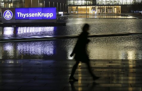 A woman walks past the of Germany's top steelmaker ThyssenKrupp headquarters in Essen November 18, 2013. REUTERS/Ina Fassbender A woman walks past the of Germany's top steelmaker ThyssenKrupp headquarters in Essen November 18, 2013. REUTERS/Ina Fassbender