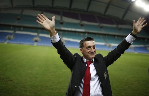 Gibraltar's coach Allen Bula greets supporters after his team's international friendly soccer match against Slovakia at Algarve stadium near Gibraltar's coach Allen Bula greets supporters after his team's international friendly soccer match against Slovakia at Algarve stadium near