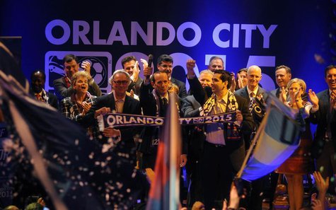 MLS Orlando City SC team president Phil Rawlins (left), MLS commissioner Don Garber, (center) and Orlando City SC Owner Flavio Augusto Da Si MLS Orlando City SC team president Phil Rawlins (left), MLS commissioner Don Garber, (center) and Orlando City SC Owner Flavio Augusto Da Si