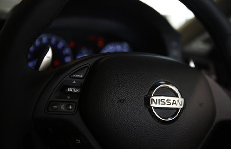 A logo of Nissan Motor Co is seen on a steering wheel of a car at the company's showroom in Yokohama, south of Tokyo November 1, 2013. REUTE A logo of Nissan Motor Co is seen on a steering wheel of a car at the company's showroom in Yokohama, south of Tokyo November 1, 2013. REUTE