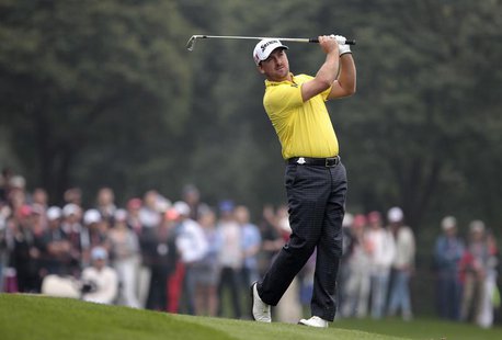 Graeme McDowell of Northern Ireland plays a shot on the 9th hole during the final round of the WGC-HSBC Champions golf tournament in Shangha Graeme McDowell of Northern Ireland plays a shot on the 9th hole during the final round of the WGC-HSBC Champions golf tournament in Shangha