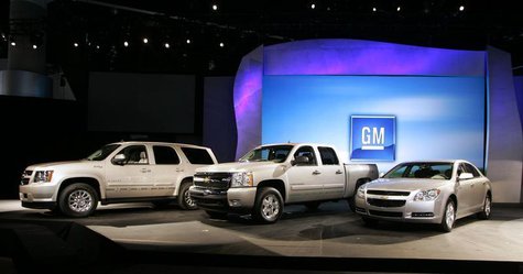 General Motors' Chevrolet hybrid vehicles including the Chevrolet Tahoe Hybrid (L), the Chevy Silverado Hybrid (C), and the Chevy Malibu Hyb General Motors' Chevrolet hybrid vehicles including the Chevrolet Tahoe Hybrid (L), the Chevy Silverado Hybrid (C), and the Chevy Malibu Hyb