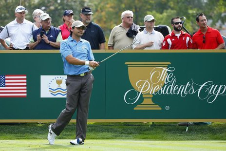 International Team player Jason Day of Australia reacts after his tee shot on the 12th hole during the second practice round for the 2013 Pr International Team player Jason Day of Australia reacts after his tee shot on the 12th hole during the second practice round for the 2013 Pr