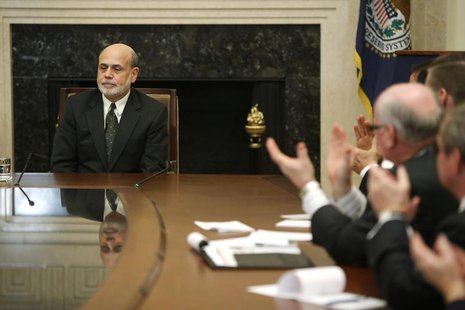 Participants applaud U.S. Federal Reserve Chairman Ben Bernanke at the end of a town hall event for teachers at the Federal Reserve board's Participants applaud U.S. Federal Reserve Chairman Ben Bernanke at the end of a town hall event for teachers at the Federal Reserve board's
