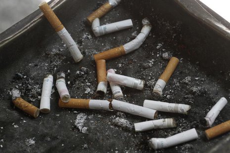 Cigarette butts in an ashtray in Los Angeles, California, May 31, 2012. REUTERS/Jonathan Alcorn Cigarette butts in an ashtray in Los Angeles, California, May 31, 2012. REUTERS/Jonathan Alcorn