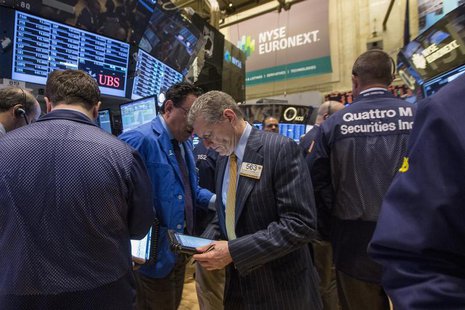 Traders work on the floor of the New York Stock Exchange, November 19, 2013. REUTERS/Brendan McDermid Traders work on the floor of the New York Stock Exchange, November 19, 2013. REUTERS/Brendan McDermid