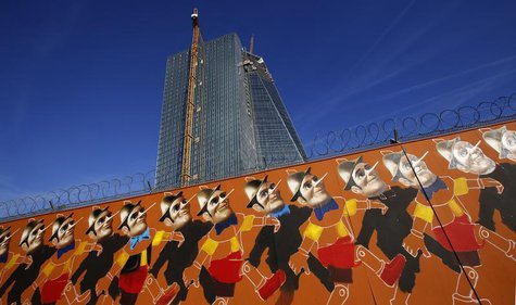 A graffiti is seen at the fence surrounding the construction site of the new headquarters of the European Central Bank (ECB) in Frankfurt, O A graffiti is seen at the fence surrounding the construction site of the new headquarters of the European Central Bank (ECB) in Frankfurt, O