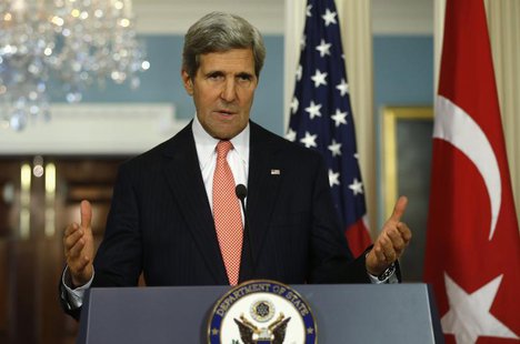 U.S. Secretary of State John Kerry answers a question as he and Turkish Foreign Minister Ahmet Davutoglu speak to reporters at the State Dep U.S. Secretary of State John Kerry answers a question as he and Turkish Foreign Minister Ahmet Davutoglu speak to reporters at the State Dep