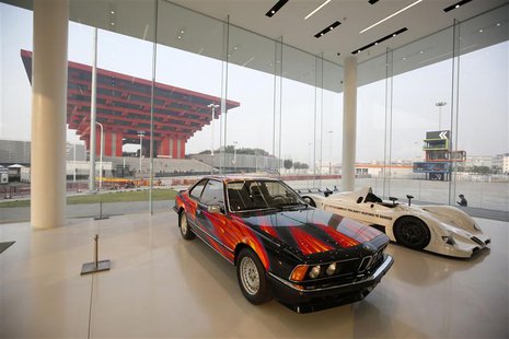 Cars are seen inside the BMW Experience Center in Shanghai November 19, 2013. REUTERS/Aly Song Cars are seen inside the BMW Experience Center in Shanghai November 19, 2013. REUTERS/Aly Song