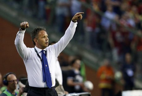 Serbia's coach Sinisa Mihajlovic reacts during their 2014 World Cup qualifying soccer match against Belgium at the King Baudouin stadium in Serbia's coach Sinisa Mihajlovic reacts during their 2014 World Cup qualifying soccer match against Belgium at the King Baudouin stadium in