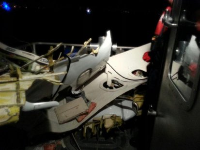 The wreckage of a plane that crashed into the Atlantic Ocean is brought aboard a U.S. Coast Guard boat off the coast of Fort Lauderdale, Flo The wreckage of a plane that crashed into the Atlantic Ocean is brought aboard a U.S. Coast Guard boat off the coast of Fort Lauderdale, Flo