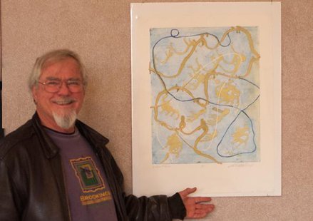 Bob Semrad of Brookings poses by "Golden Oldies," a print he created in which the blue, gold and white strings represent his interconnected journey through life as a pilot, a forester and a pastor/chaplain. The print, as well as 29 other items, will be auctioned off Saturday at DVAGI's 10th annual fundraiser. SDSU.edu Bob Semrad of Brookings poses by "Golden Oldies," a print he created in which the blue, gold and white strings represent his interconnected journey through life as a pilot, a forester and a pastor/chaplain. The print, as well as 29 other items, will be auctioned off Saturday at DVAGI's 10th annual fundraiser. SDSU.edu