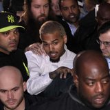 Rapper Chris Brown (C) leaves the U.S. District Court in Washington October 28, 2013. REUTERS/Yuri Gripas Rapper Chris Brown (C) leaves the U.S. District Court in Washington October 28, 2013. REUTERS/Yuri Gripas