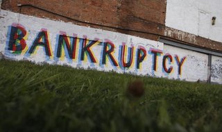 The word "Bankruptcy" is painted on the side of a building in Detroit, Michigan October 25, 2013. REUTERS/Joshua Lott The word "Bankruptcy" is painted on the side of a building in Detroit, Michigan October 25, 2013. REUTERS/Joshua Lott