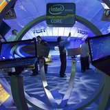 Gopi Sirineni (C) of San Jose, California takes a video of the Intel booth during the 2012 International Consumer Electronics Show (CES) in Gopi Sirineni (C) of San Jose, California takes a video of the Intel booth during the 2012 International Consumer Electronics Show (CES) in